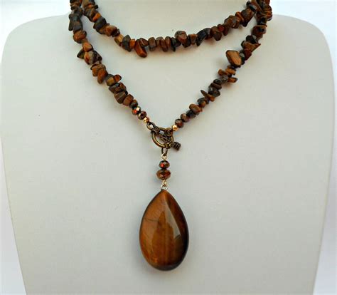 The protective properties of a tiger eye stone necklace: shielding yourself from negativity